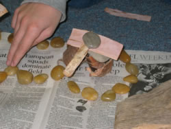 Planning the Inuksuk using stones.
