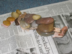 Planning the Inuksuk using stones.