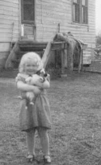 Joyce Neilson holding puppy. Private collection of Joyce Neilson.