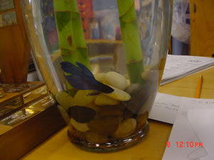 Glass bowl with fish.